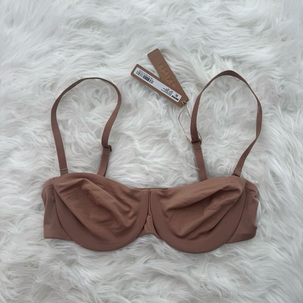 Skims Smoothing Intimates Unlined Strapless Bra Sienna
Size 34B